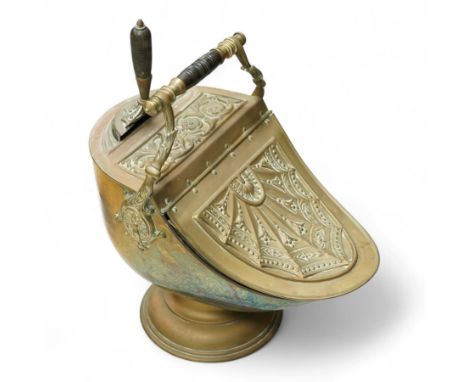 Victorian brass and copper helmet shaped coal scuttle with embossed hinged cover, turned wood handle and scoop H50cm