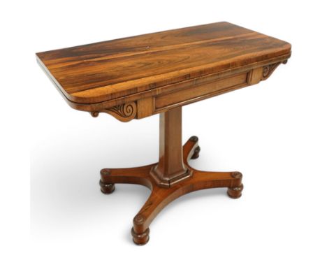 Regency style rosewood fold over card table, red baize, tapered pedestal column on X-form base with ball castor feetDimension
