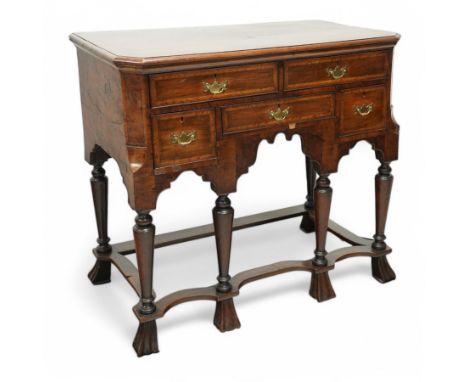 William and Mary design 18th century walnut and yew wood dresser or console table, rectangular canted top with feather bandin