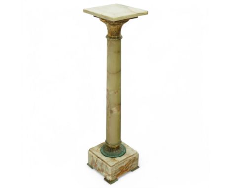20th century green Onyx pedestal square top above brass acanthus leaf capital with fluted brass collar supported on a plinth 