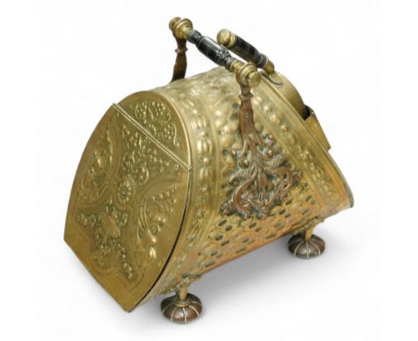 Victorian brass coal scuttle and liner, of helmet form with embossed floral bands and applied foliate mounts, swing handles w