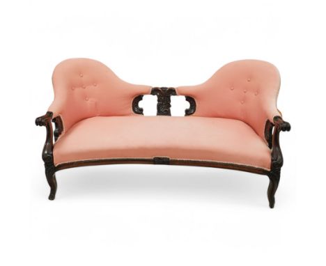 Mid-19th century carved rosewood double-ended settee, double spoon back with central splat carved with C-scrolls and shells, 