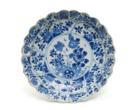 18th century Chinese Kangxi period blue and white lobed dish, decorated with flowers and blossoms, character mark to base, D1