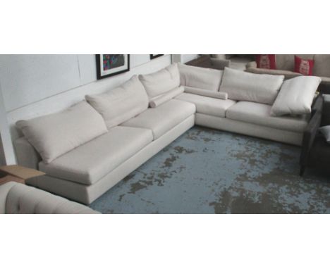 CORNER SOFA, by Flexiform, in cream, on metal supports, 336cm x 261cm. 