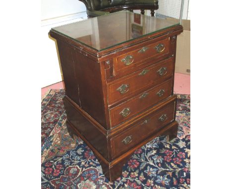 BACHELOR'S CHEST, Edwardian style mahogany with an inlaid flip over top over four drawers and bracket supports, 54cm x 49cm x