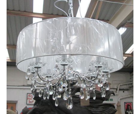 CHANDELIER, eight branches, with glass drops on a chromed metal frame and circular shade, 50cm H, plus chain. 