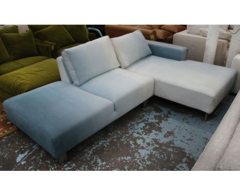 DESIGNERS GUILD L SHAPED SOFA, blue and white graduated fabric comprising two sections with loose cushions on aluminium suppo