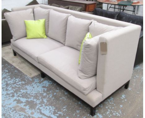 LINDEN DESIGN SOFA, with oatmeal upholstery on short square ebonised supports, 234cm L. 