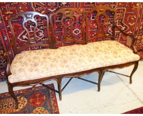 SOFA, early 20th century Continental birch with triple chair back and a loose floral patterned seat cushion on cabriole suppo