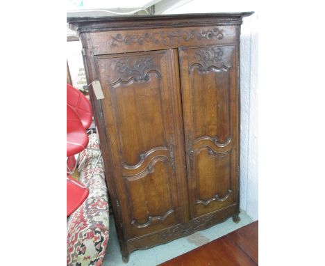 ARMOIRE, Louis XV oak, with a pair of panel doors enclosing shelves 210cm H x 136cm x 55cm.(with faults) 