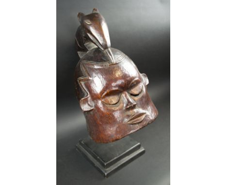 EKOI PEOPLE HELMET MASK, carved wood, 43cm H plus display stand.