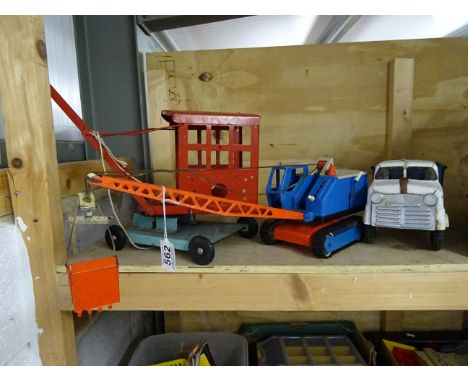 Triang Transport Truck, a metal crane and a Gama crane plus a Matchbox garage 