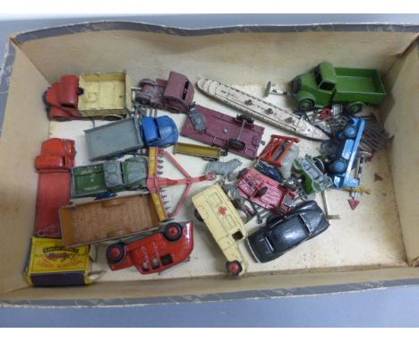 Collection of vintage play worn diecast Dinky vehicles to include Commercial, Daimler Ambulance, Fire Engine etc plus farming