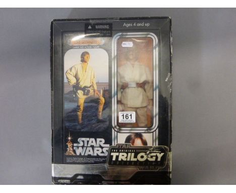 Boxed Hasbro Star Wars The Original Trilogy Collection Luke Skywalker figure appearing unopened and vg