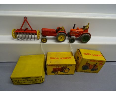 Three boxed Dinky farming vehicles to include 300 27A Massey Harris Tractor in red, with head missing, play worn, 301 Field M