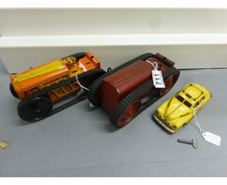 Vintage Triang Tractor No 2 in red and a Marx tin plate tractor in orange, both with replacement tracks and play wear plus a 