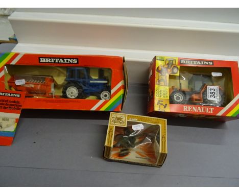 Two boxed Britains farming vehicles to include 9588 Tractor with trailer and 9518 Renault Tractor plus a boxed 1/32 9724 105m