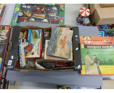 Group of vintage toys and games to include jigsaw puzzles, tin plate Police plane etc