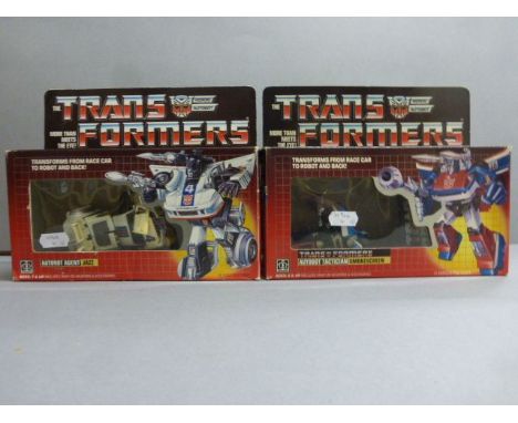 Two boxed Hasbro Takara G1 Transformers to include Smokescreen, play worn with doors loose, with three accessories, box gd an