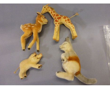 Group of five Steiff animals to include kangaroo with plastic baby, giraffe, Bambi and a wild boar, dates range from 1960's t