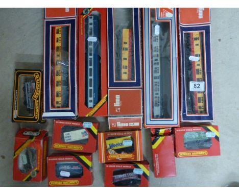 13 Boxed OO gauge items of rolling stock to include coaches and wagons featuring Lima, Hornby & Mainlinne