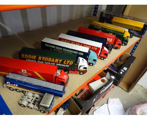 11 Corgi Modern Trucks with one cased (Bodingtons) to include Royal Mail, Eddie Stobart, Heineken, Gulf etc overall condition