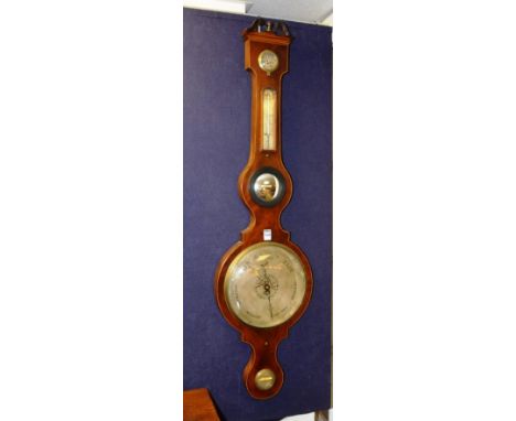 A 19th century mahogany wheel barometer, with silvered dial, thermometer and temperature gauge, named F Porri, Dublin to spir