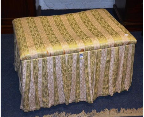 An Ottoman style stool, the rectangular hinged cushioned top over valance, 78cm wide x 50cm high x 54cm dep
