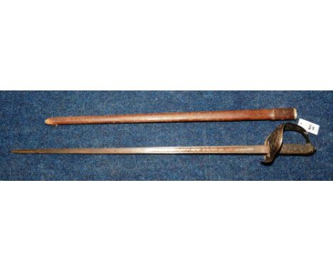 A George V Officers Sword, with flat pommel, shagreen and wire grip, metal hilt with crest and foliate decoration, etched dec