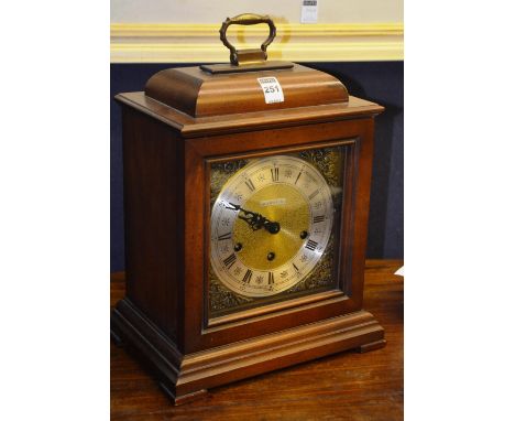 A George III style mahogany bracket clock, by Barwick, West Germany, with a gilt dial decorated with spandrels, silvered chap