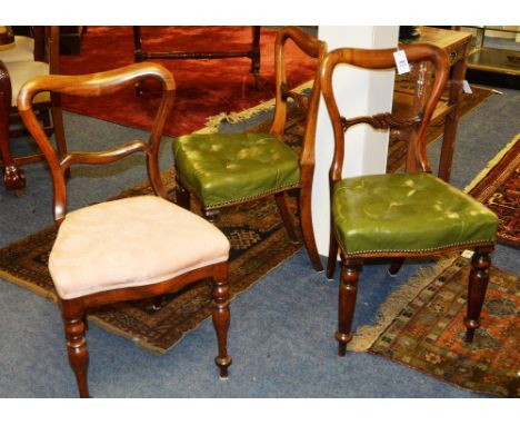 A set of six Victorian rosewood chairs, with heart shaped back, scroll carved splat and green leather button seat, raised on 