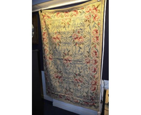 A wall hanging tapestry, with foliate decoration on cream ground, 178cm long