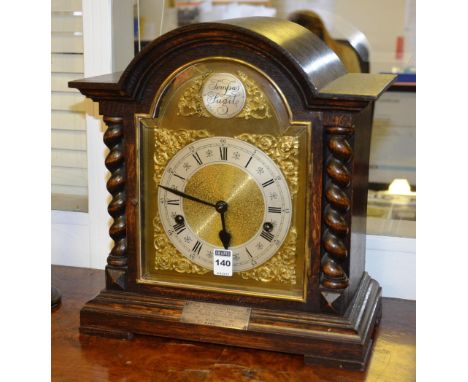 A Tempus Fugit bracket clock by Telfor, Keswick, the oak arched case with brass face, applied spandrels and chapter ring, Rom