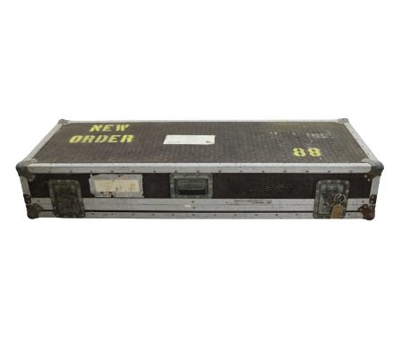NEW ORDER 88 KEYBOARD FLIGHT CASE. With "New Order 88" stencil. Made by Penn Fab Ltd. Measures 137x50x25cm.These flight cases