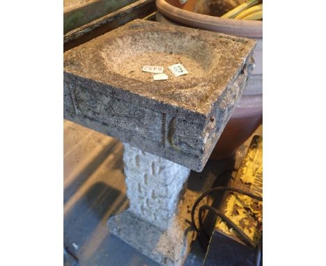 Stone bird bath H: 61 cm   CONDITION REPORT:  This item splits into two separate pieces.Top piece = 28 cm squared