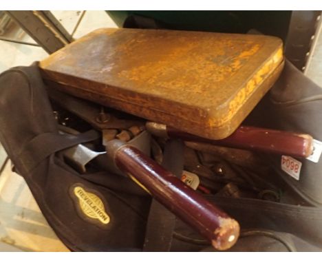 Canvas carry bag of tools including sockets