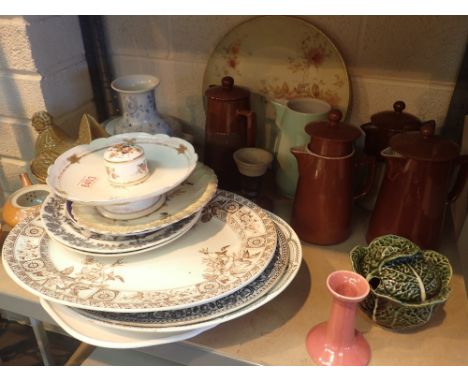 Shelf of mixed ceramics 