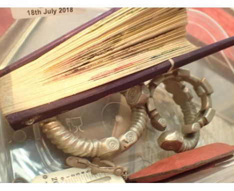 Three African bangles Salter postage scales and a folding fan