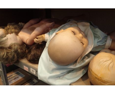 Shelf of mixed 1960s and 1970s dolls 