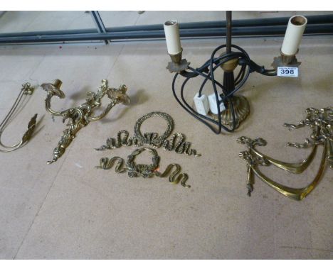 Collection of Brass interior wall furniture to include two pairs of curtain tie backs, a pair if candle style electric wall l