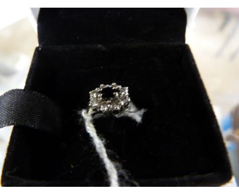 Sapphire and Diamond ring with Marqeuis set sapphire across the ring with eight Brilliant cut diamonds UK - M USA - 6 