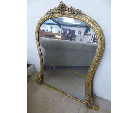 Gilt overmantle mirror with floral finial to top