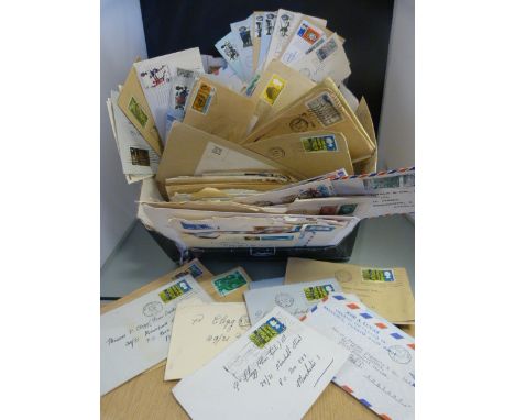 Box containing various loose stamps and first day covers