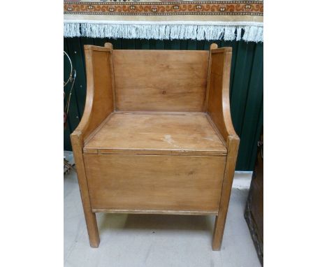 Antique Pine commode with high seated back and campaign style brass handles