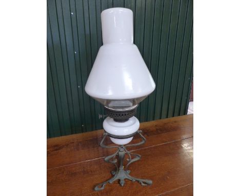 Converted oil lamp with glass well and large white glass chimney on metal base approx. 70cm H