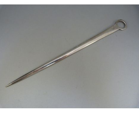 George III Silver meat skewer with ring handle and bearing a Griffin crest with initials below "S P E". Hallmarked 1800. Make