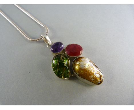 Silver 925 21g Pendant and Chain. Contemporary design set with Glass pebbles in approx 12mm x9.5mm faceted Ruby and an approx