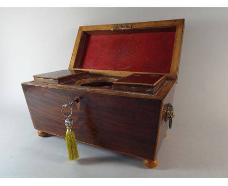 A 19th Century Mahogany Two Division Tea Caddy with Boxwood Stringing and of Sarcophagus Form. Hinged Lid to Fitted Interior 