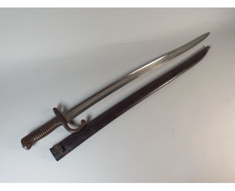 A Brass Handled Bayonet, Numbered 16854 Together with Similarly Numbered Scabbard The Blade Top Inscribed 7th Etienne, 1871. 