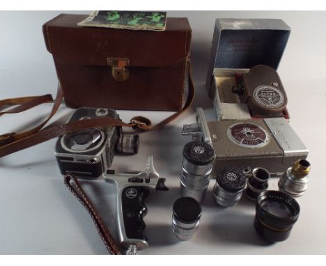 A Bell and Howell Filmo Double Run Eight Cine Camera in Sportster Box (Clockwork Motor Broken) Together with A Bolex C8L Came